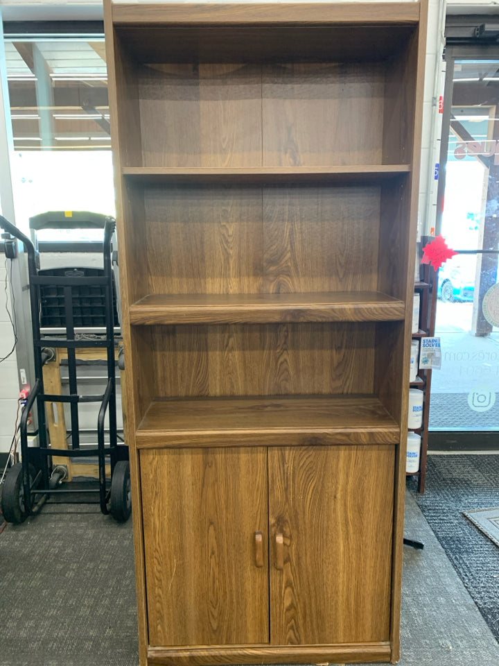 DARK FAUX WOOD BOOKCASE W/ BOTTOM CABINET.
