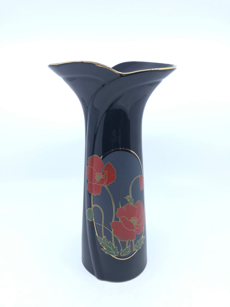 BLACK VASE W RED FLOWERS AND GOLD ACCENTS.