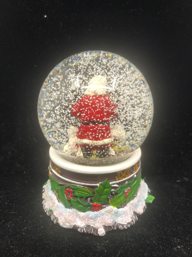 SANTA W INFANT MUSICAL SNOW GLOBE.