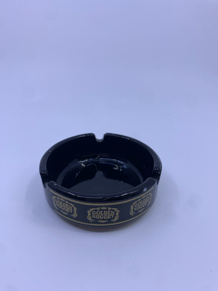 VTG GOLDEN NUGGET BLACK GLASS ASHTRAY.