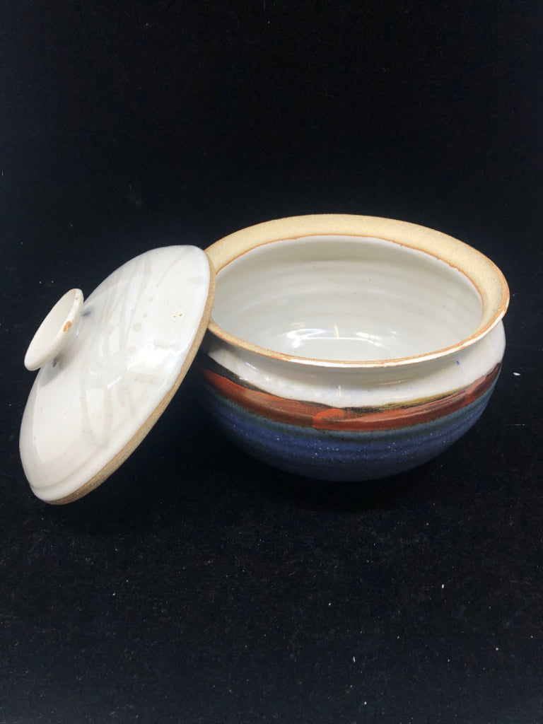 ROUND BLUE AND RED POTTERY CANISTER.
