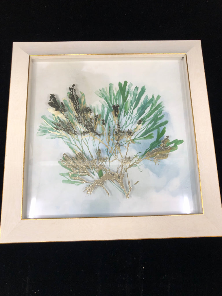 CORAL IN WHITE FRAME W/ GOLD EDGES.