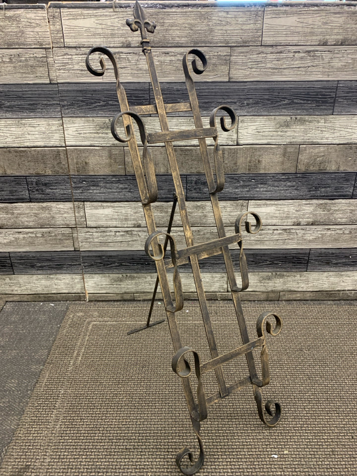 STANDING METAL MAGAZINE RACK.
