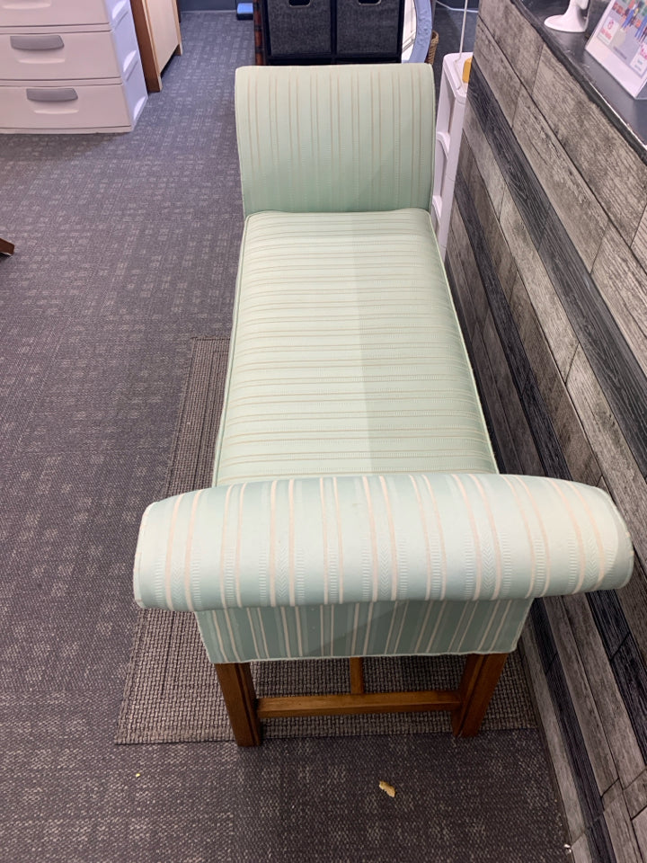 MINT GREEN W/ STRIPES BENCH W/ RAISED EDGES.