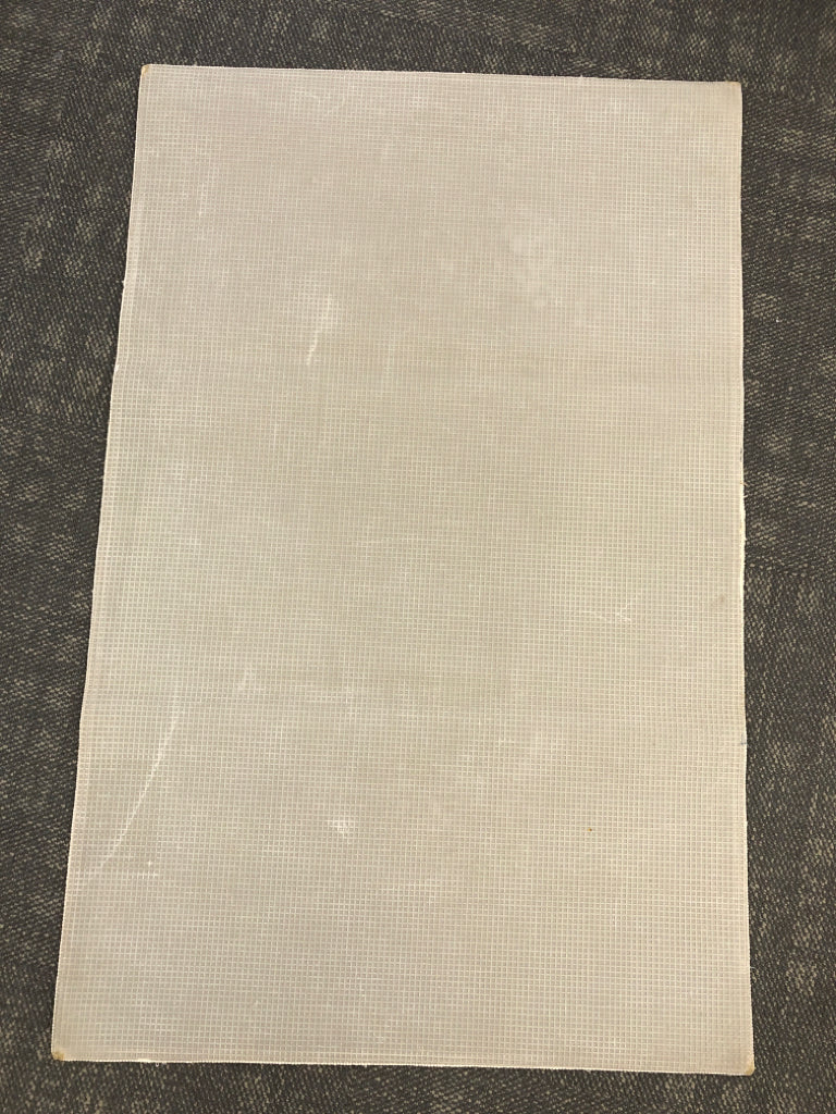 TAN/BROWN FLORAL RUG.