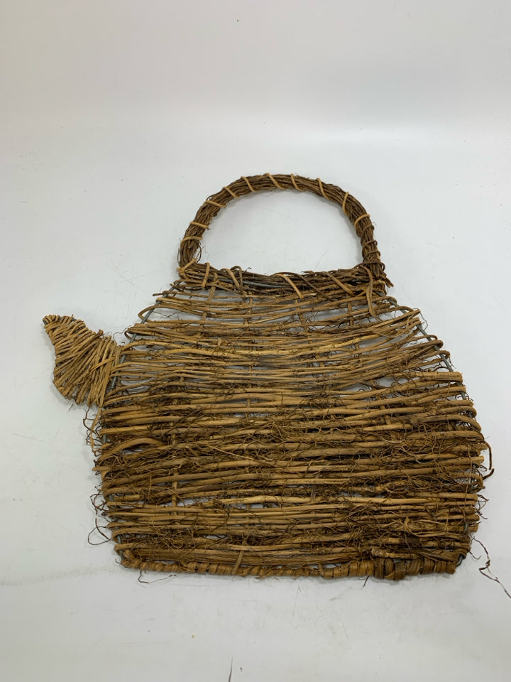 STICK WOVEN TEA POT SHAPED WALL HANGING.