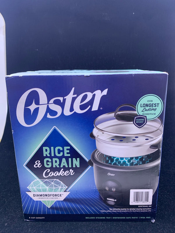 NIB OSTER RICE AND GRAIN COOKER.