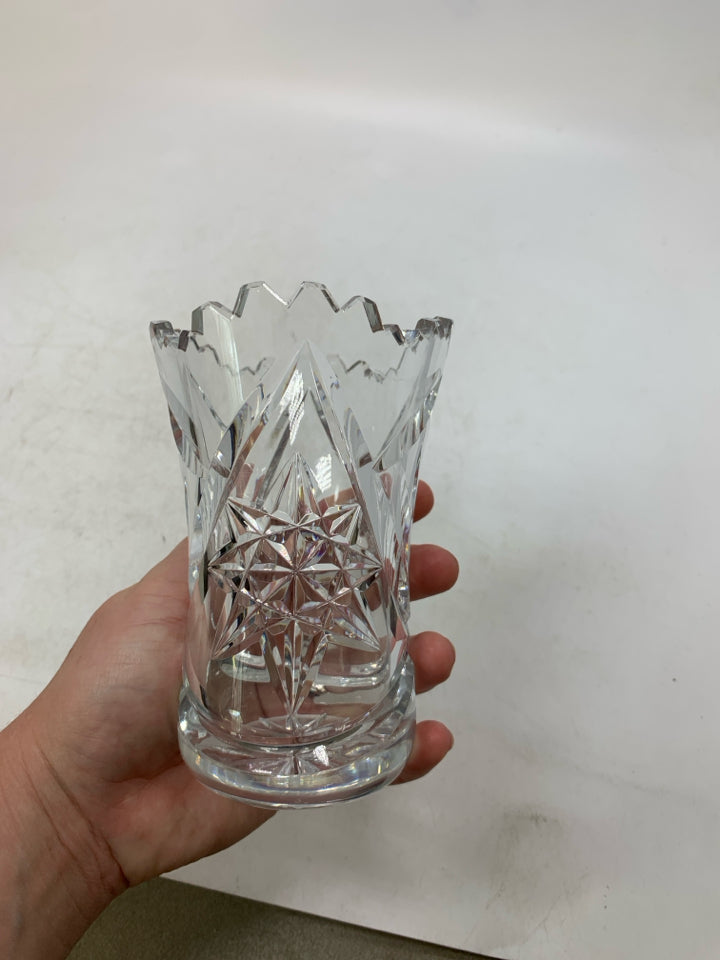 HEAVY BOTTOM STAR PATTERN CRYSTAL VASE W/ UNEVEN TOP.