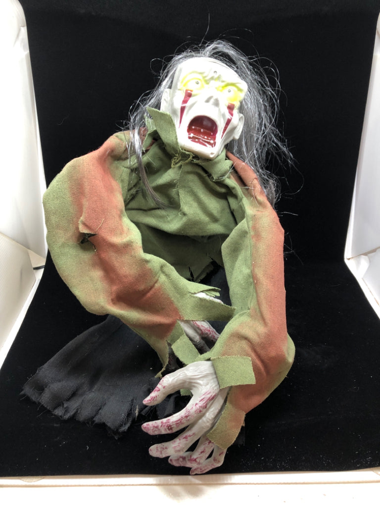 PLASTIC ZOMBIE HALLOWEEN DECOR.