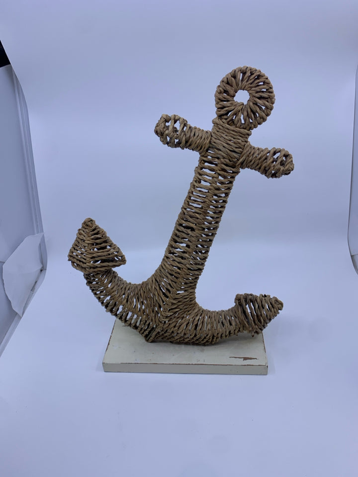 WICKER ANCHOR ON CREAM STAND.