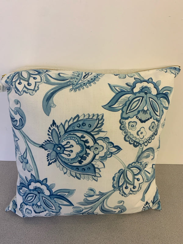 BLUE/WHITE PATTERNED SQUARE PILLOW.