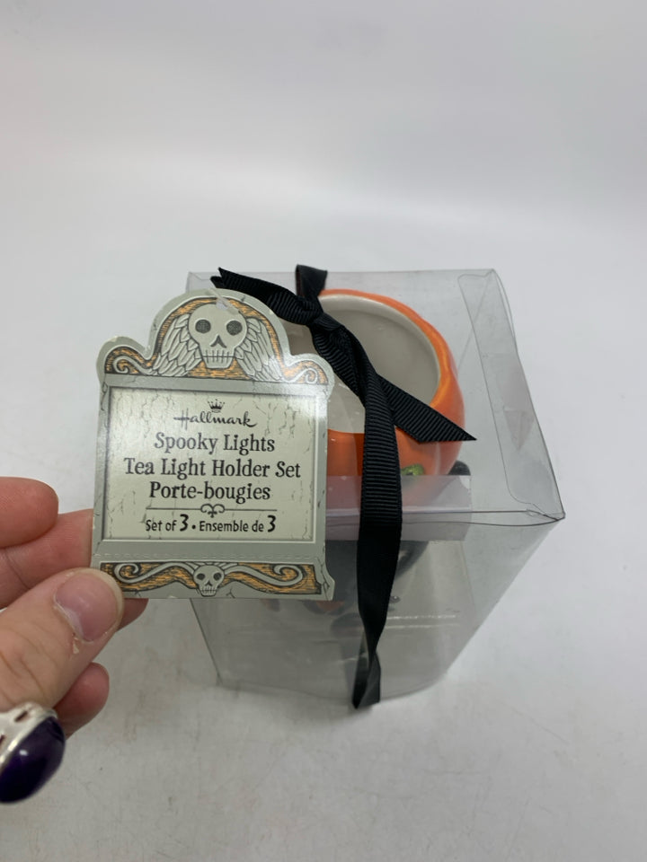 3 TEA LIGHT HOLDERS IN PACKAGE HALLMARK SKULL,JACKO LANTERN,CAT.