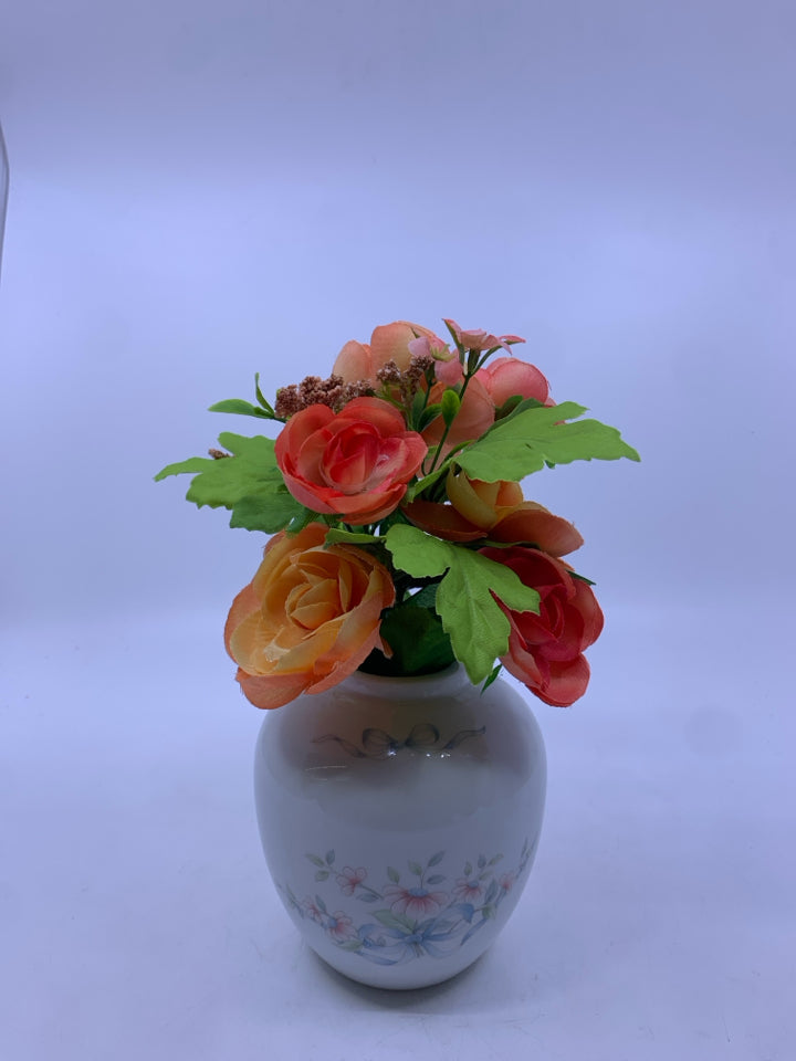 FAUX ORANGE FLORAL IN ROUND PINK FLORAL PRINCESS HOUSE VASE.