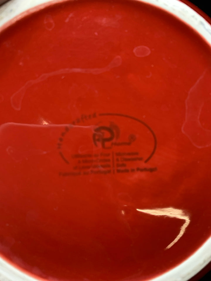 RED CERAMIC PITCHER.