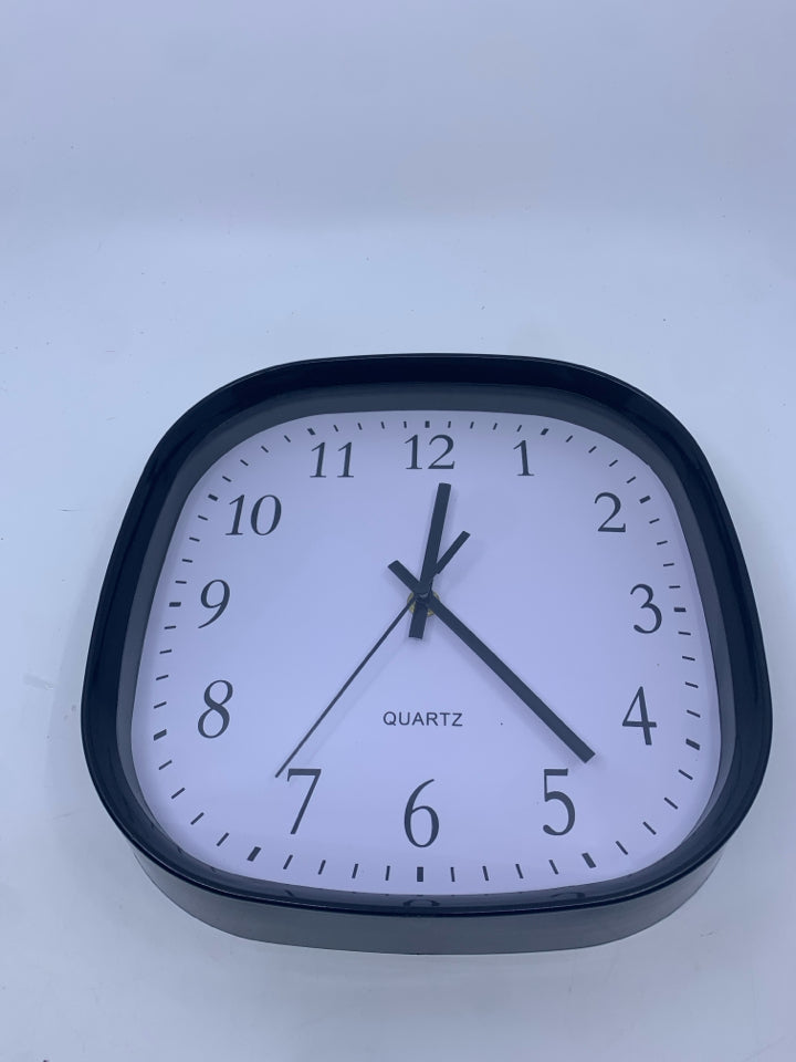 BLACK QUARTZ ROUNDED SQUARE CLOCK.