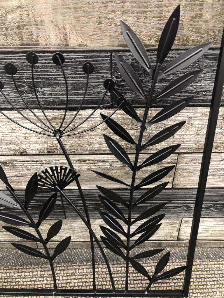 BLACK METAL DANDELION AND LEAVES WALL HANGING.