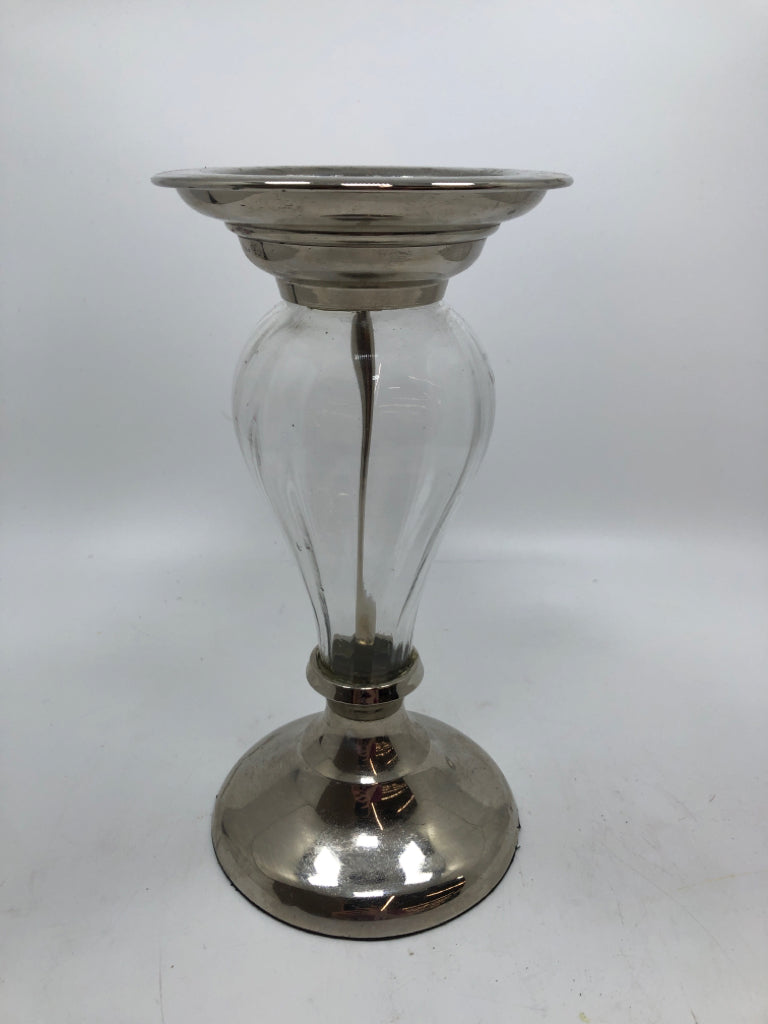 GLASS AND SILVER PILLAR CANDLE HOLDER.