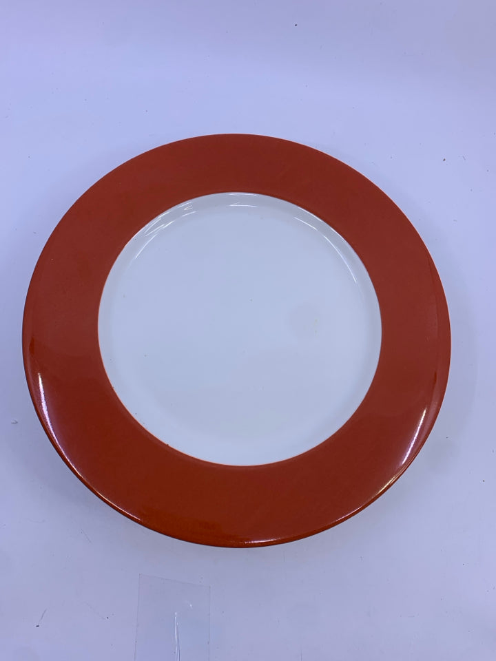 7 BURNT ORANGE CRATE AND BARREL DINNER PLATES.