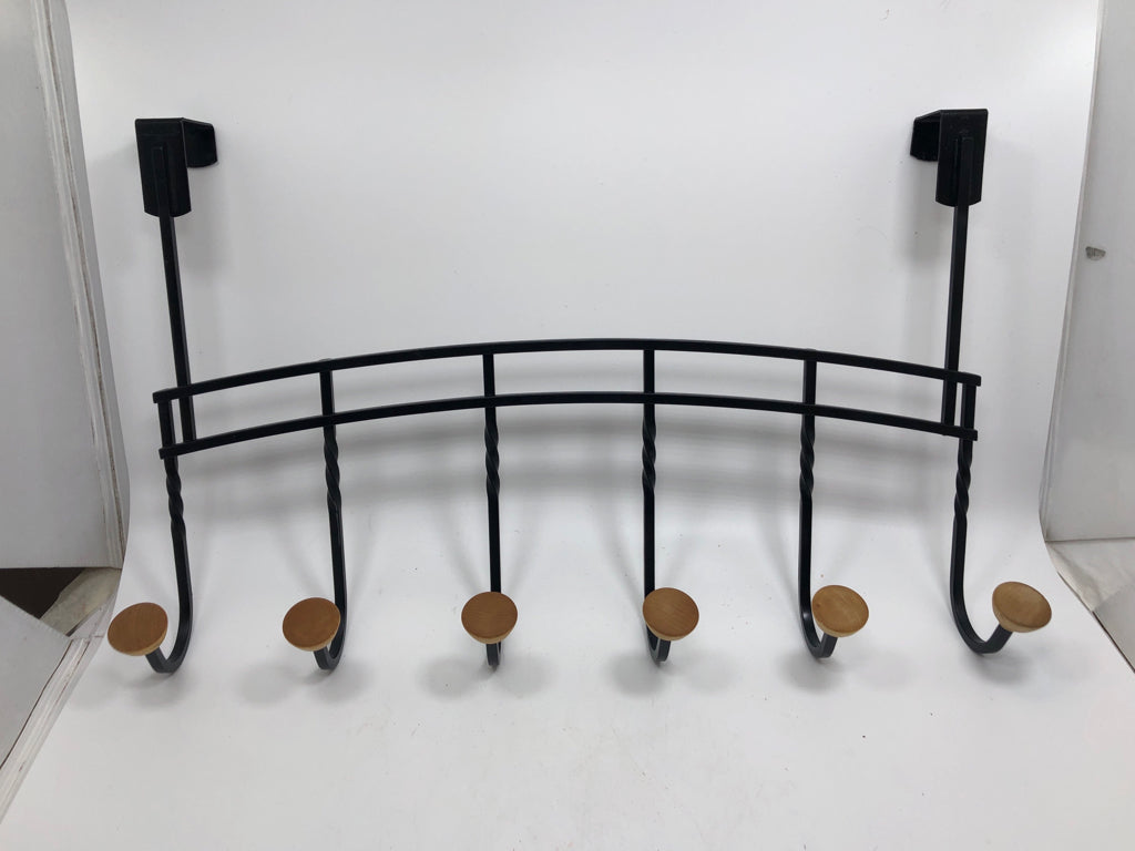 BLACK METAL AND WOOD OVER DOOR COAT HOOK.