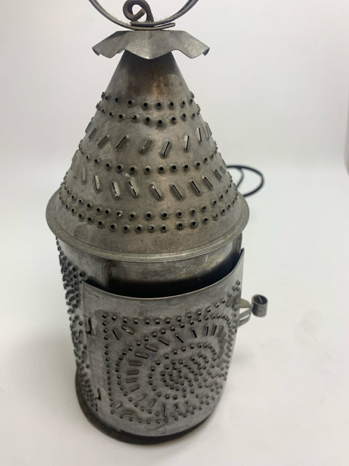 PUNCHED SILVER METAL LANTERN.