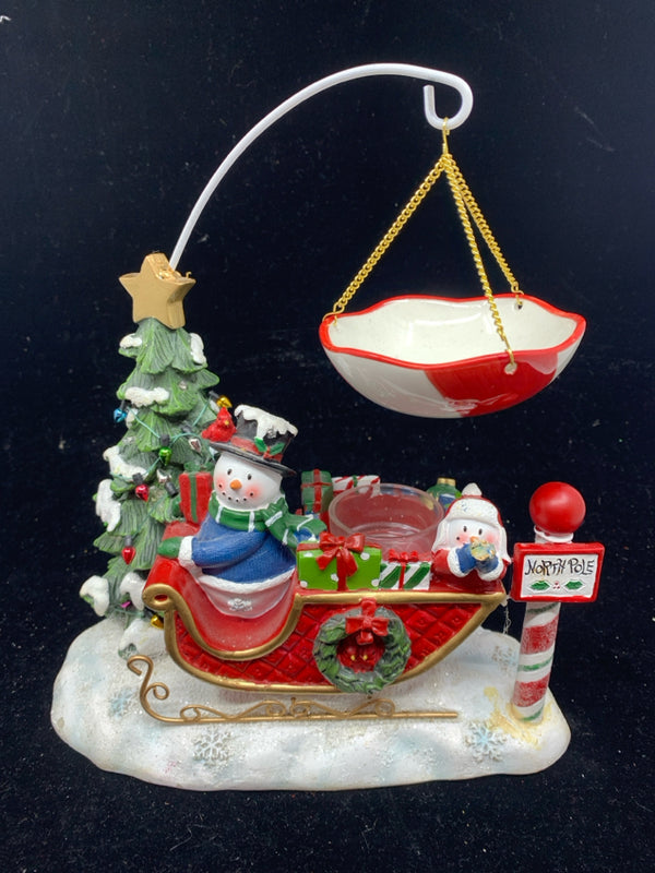 YANKEE CANDLE SNOWMAN ON SLED TEA LIGHT HOLDER AND WAX WARMER.