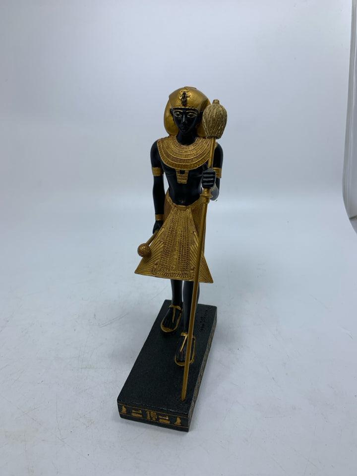 GOLD STANDING EGYPTIAN STYLE MAN W/ SANDALS HOLING STICK RESIN.