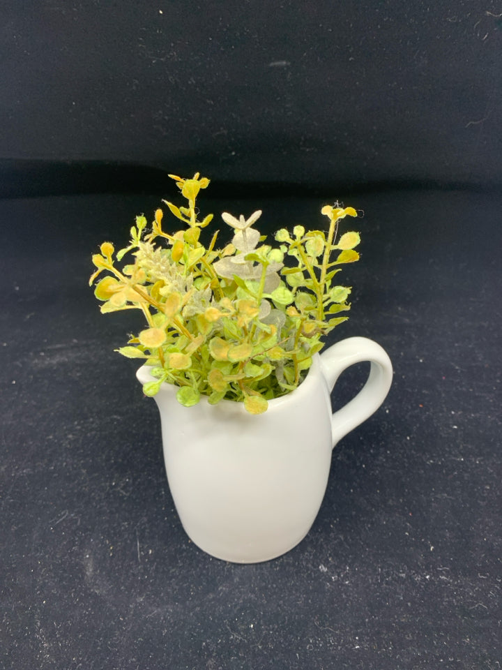 SMALL WHITE PLANTER W/ FAUX GREENS.