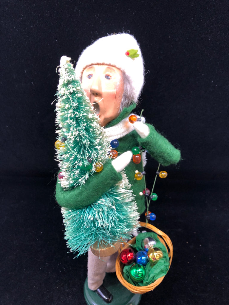 BYERS' CHOICE MAN HOLDING CHRISTMAS TREE- 1996.