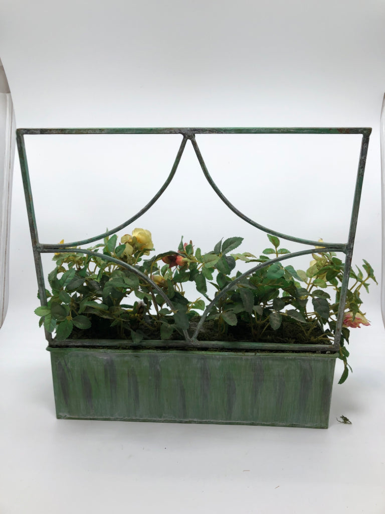 FAUX ROSES IN GREEN METAL PLANTER BOX.