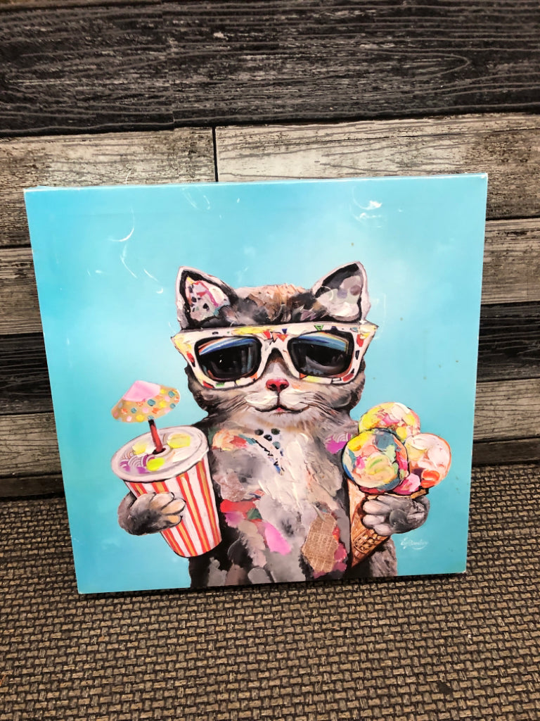 CAT HOLDING ICE CREAM CANVAS WALL ART.