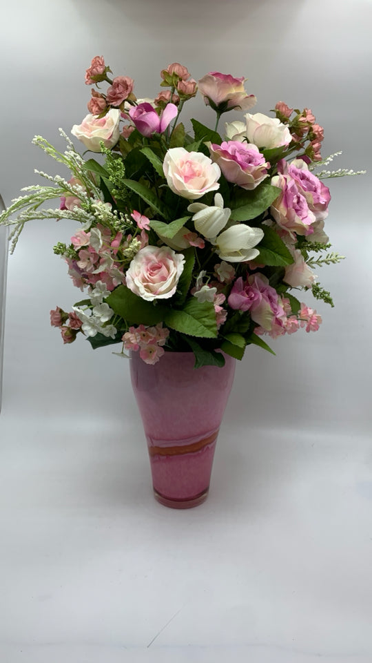 FAUX PINK ROSES IN PINK GLASS VASE.