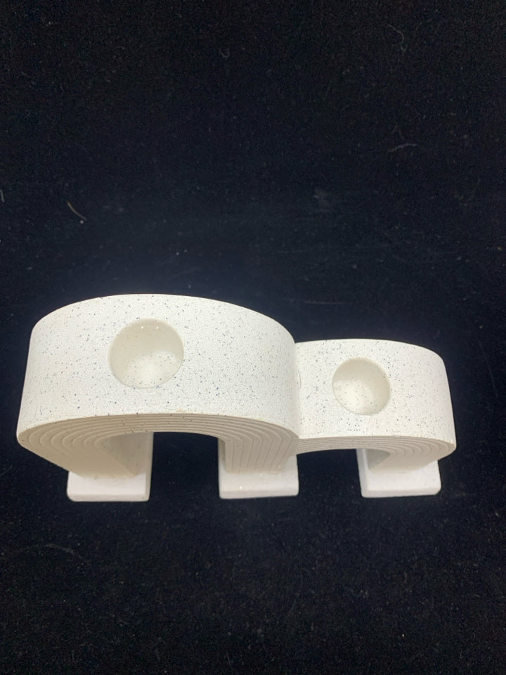 DOUBLE ARCHED CANDLE HOLDER.