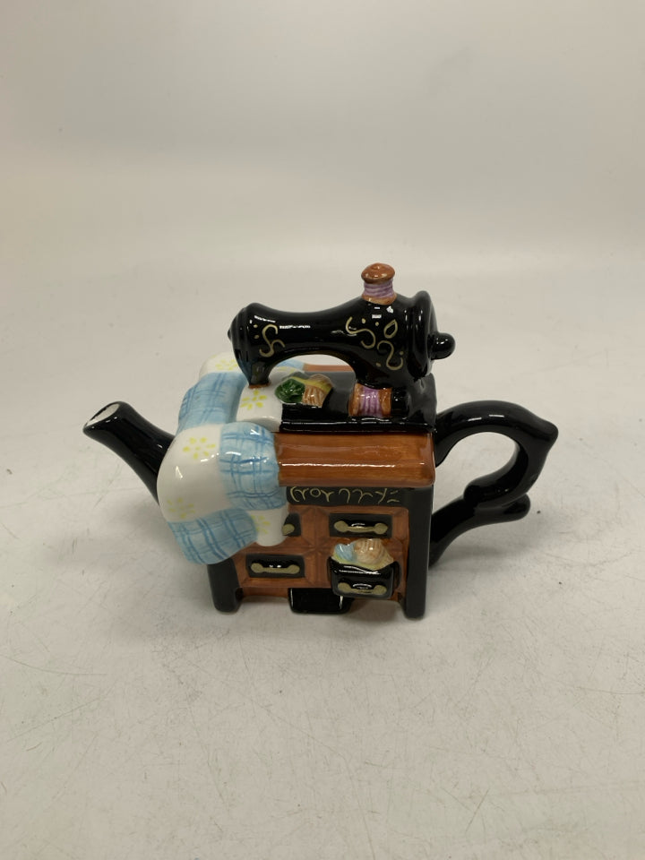 SMALL SEWING TABLE W/ MACHINE TEA POT.