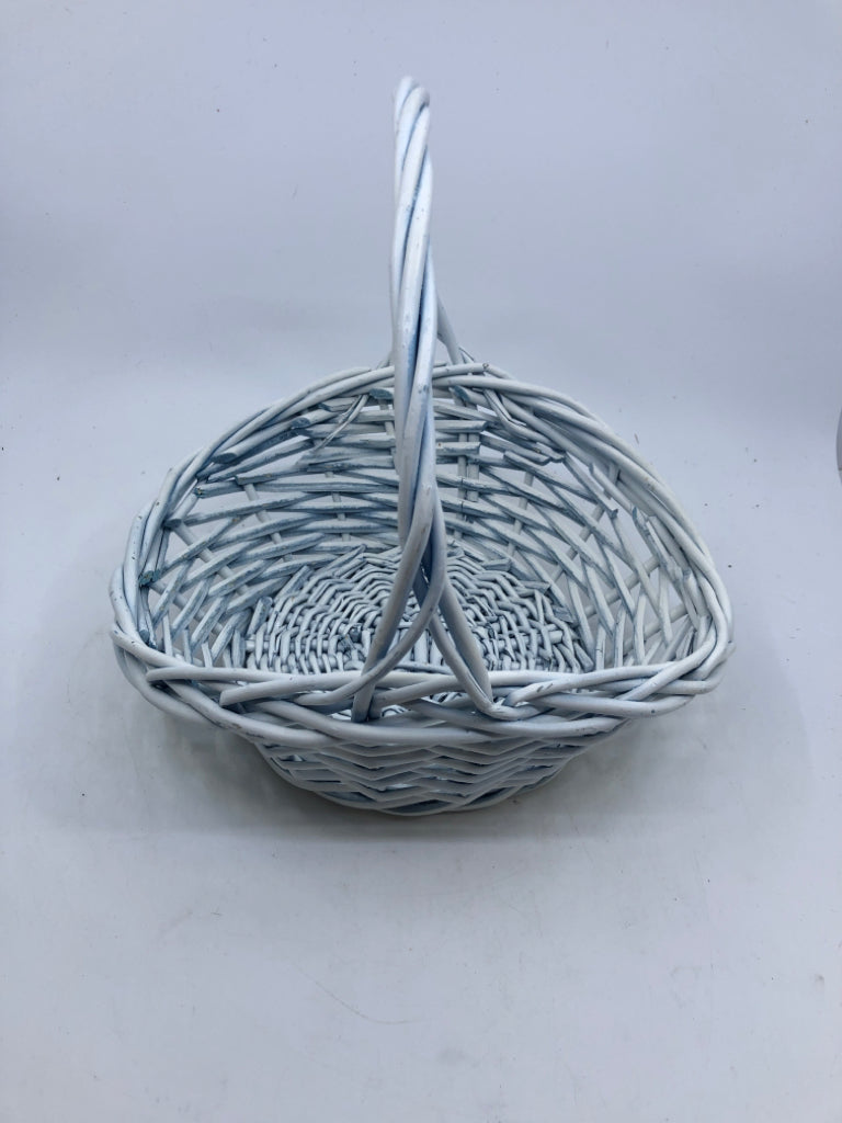 WHITE SLIGHT FAN SHAPED BASKET.