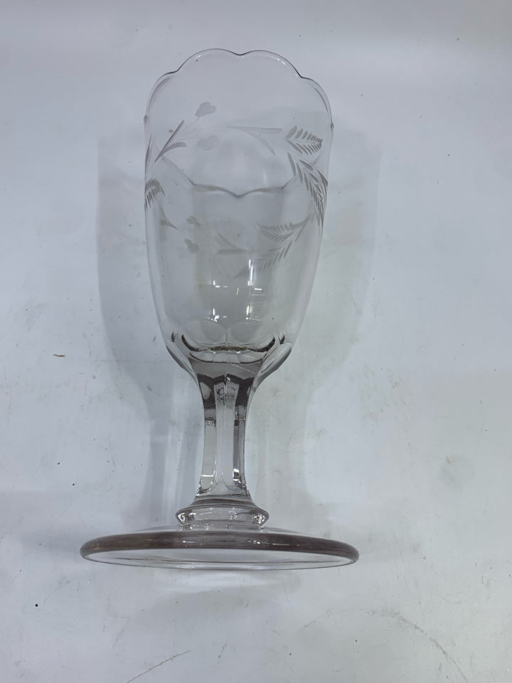VTG FOOTED CLEAR GLASS VASE W/ETCHED FLOWERS.