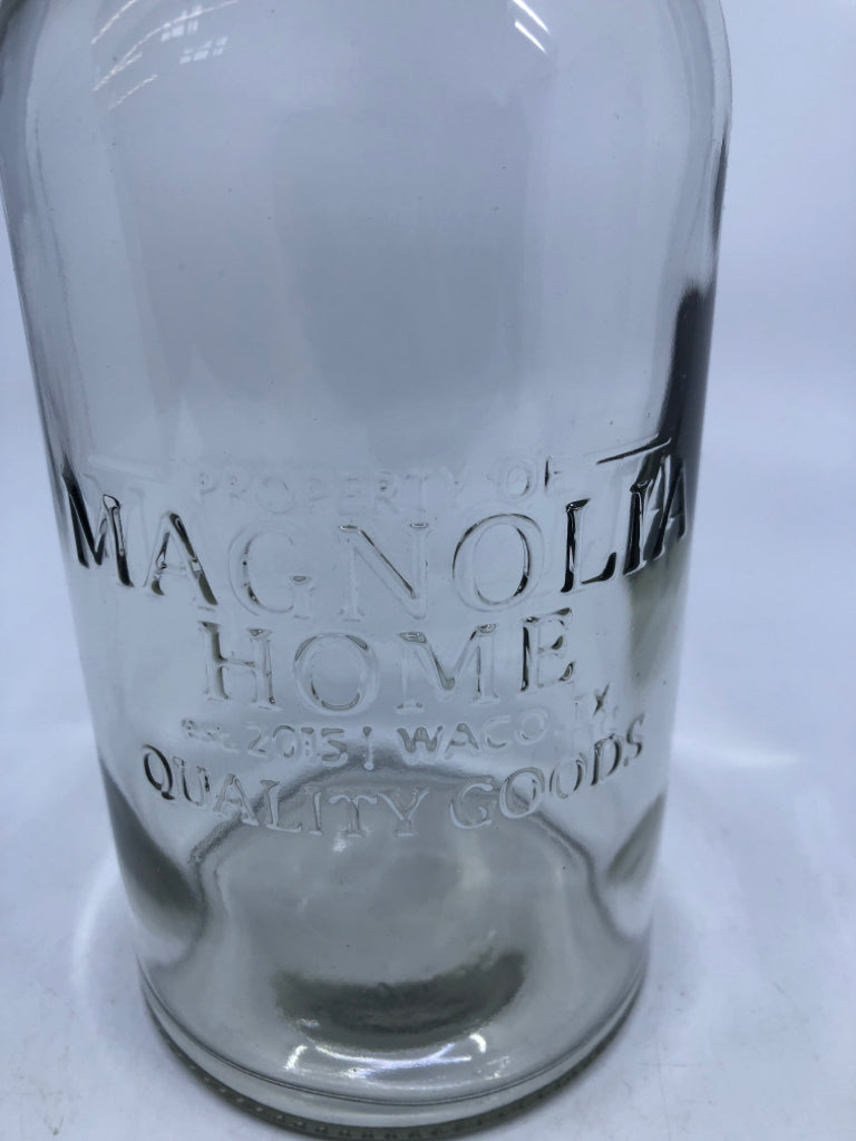 MAGNOLIA HOME GLASS BOTTLE W/METAL TOP.