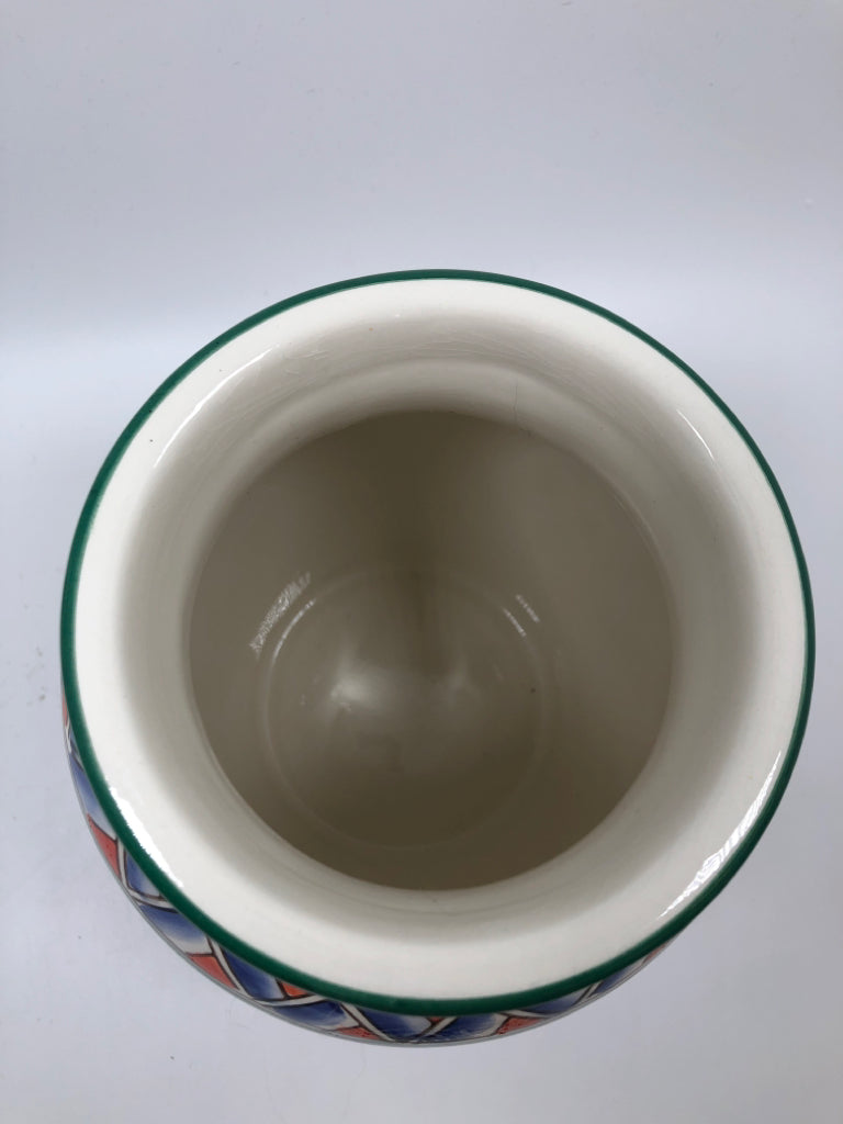 MULTI-COLORED BLUE/ YELLOW ROUNDED JAR.