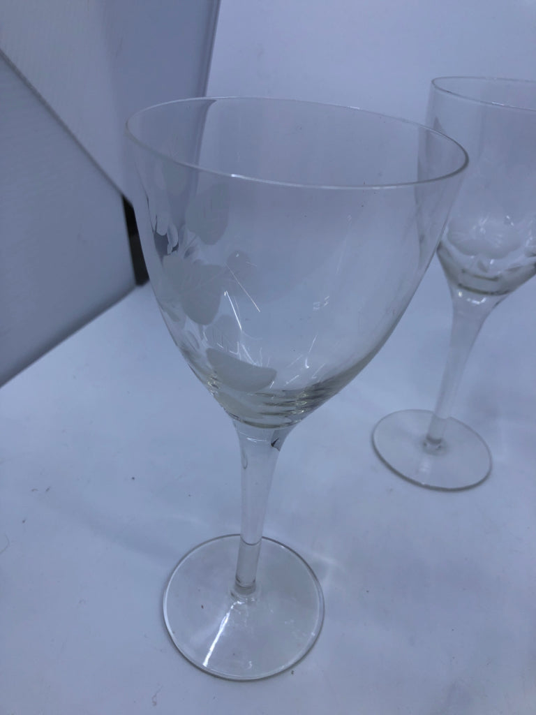 4 LIGHT WHITE ETCHED FLORAL WINE GLASSES.