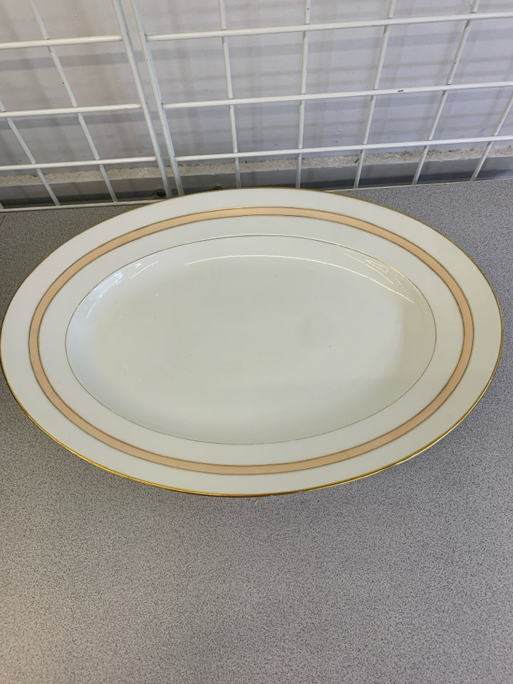 PEACH STRIPE OVAL CERAMIC SERVING PLATTER W/GOLD TRIM.