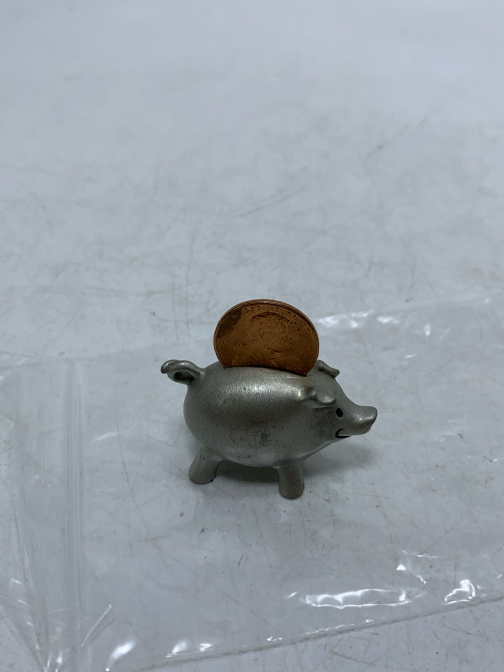 MINI PIGGY BANK W/ PENNY FIGURINE.