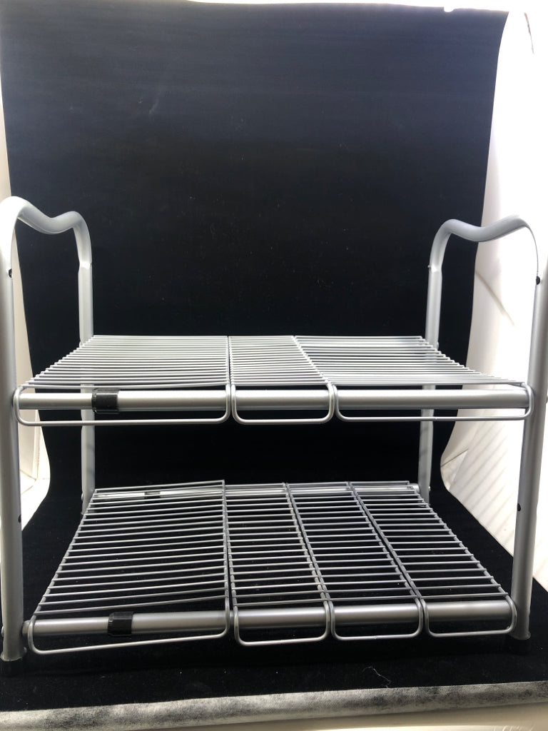 SMALL SILVER METAL SHOE RACK.