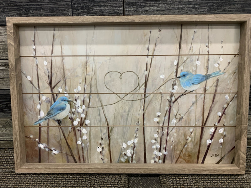 BLUE BIRDS WOOD WALL HANGING IN LIGHT FRAME.