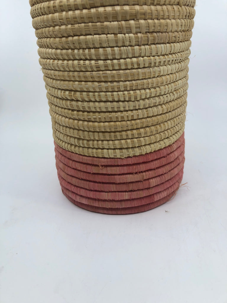 WOVEN BASKET VASE W/ DARK PINK BOTTOM.