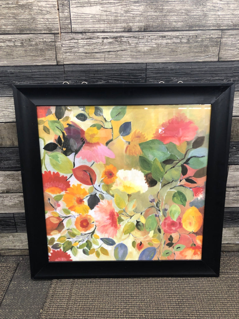 COLORFUL FLORAL IN BLACK FRAME WALL HANGING.