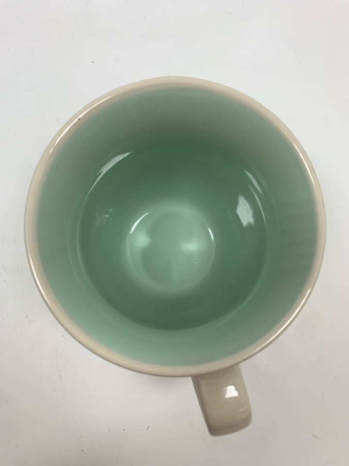 'MY KID IS TURNING OUT' MUG.