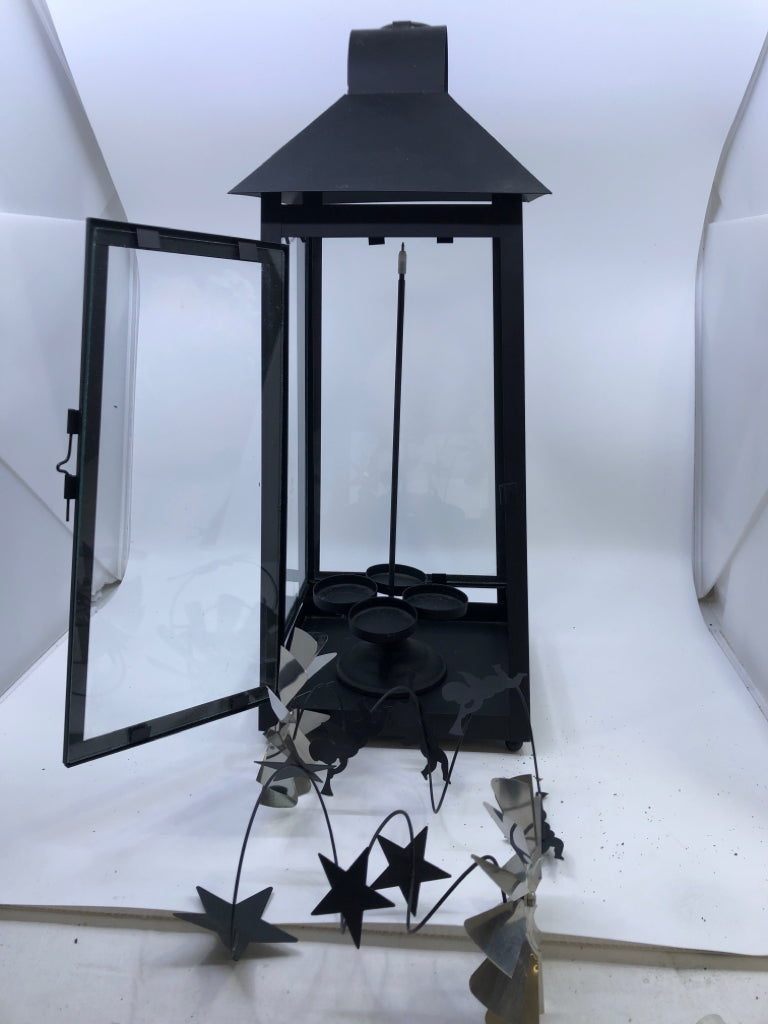 BLACK METAL TEALIGHT LANTERN WITH HOLIDAY OPTIONS .