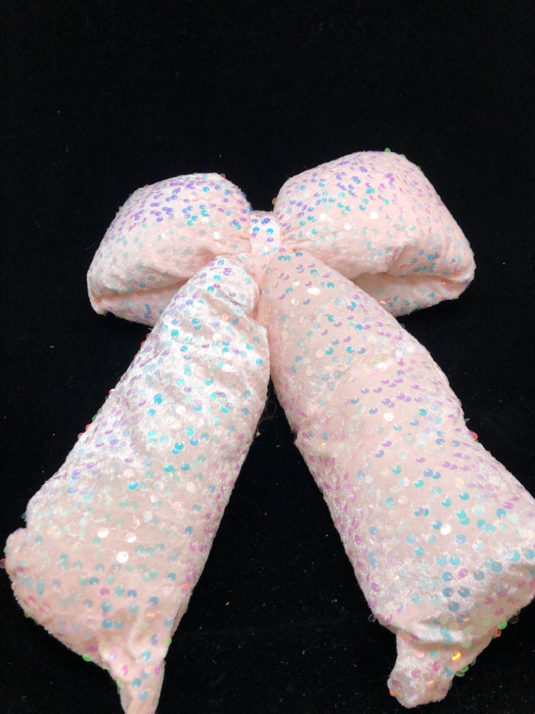 PINK PLUSH BOW W/ IRIDESCENT SEQUINS.