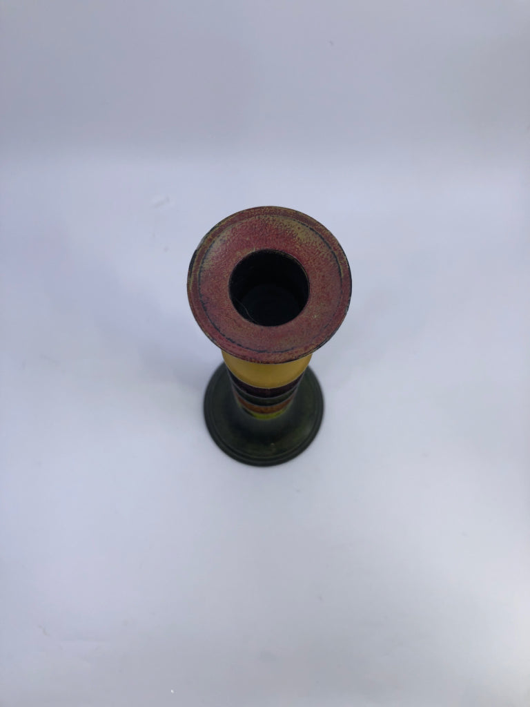 MULTI COLORED DISTRESSED CANDLE HOLDER.
