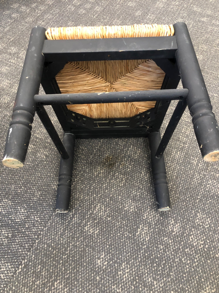 KIDS BLACK TABLE W/2 WICKER CHAIRS.