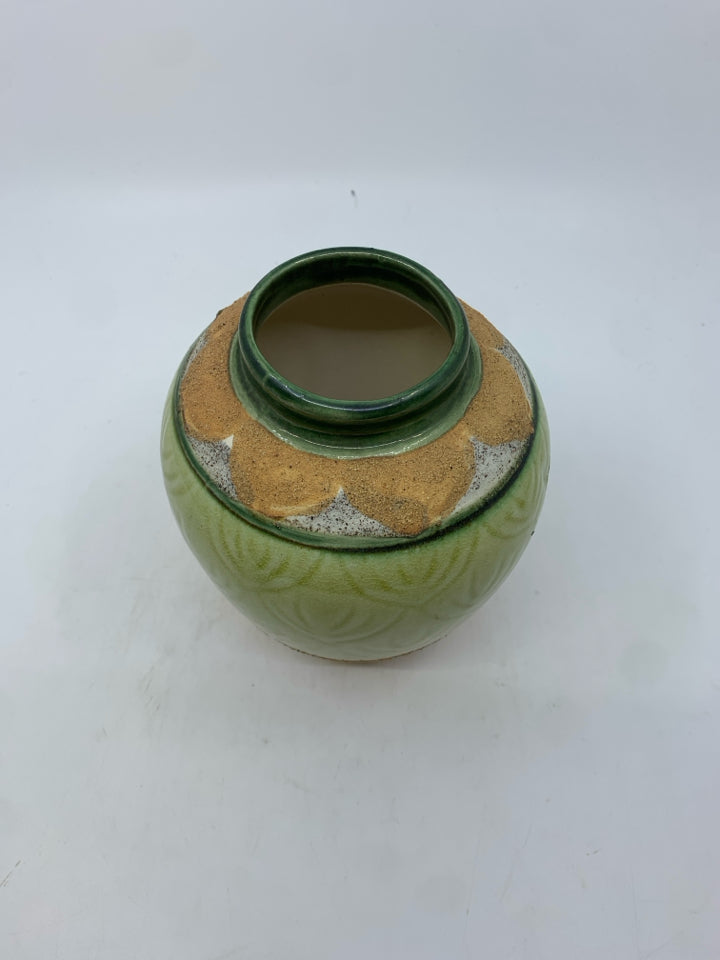 GREEN GLAZED POTTERY VASE.